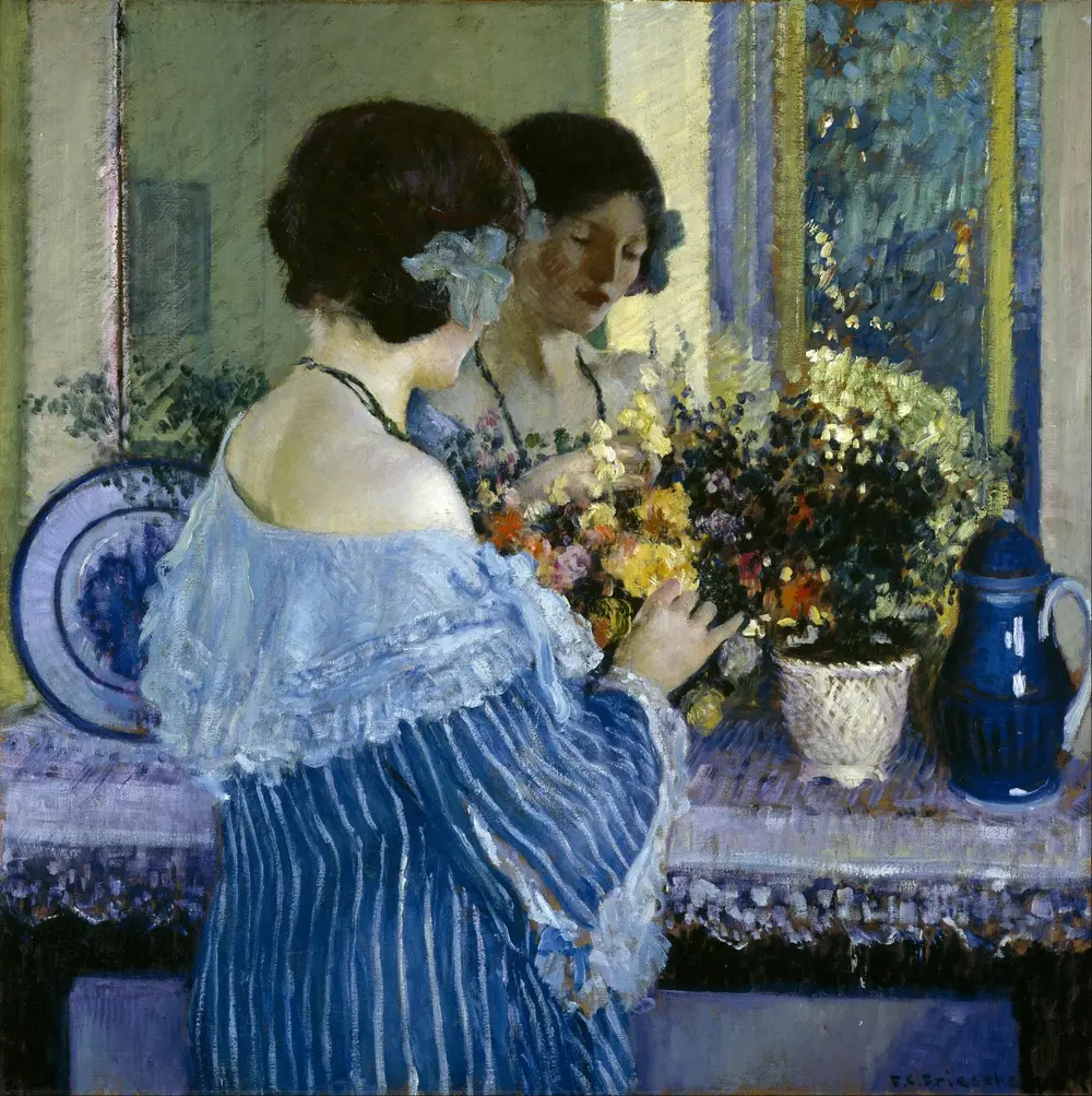 Girl in Blue Arranging Flowers — Frederick Carl Frieseke