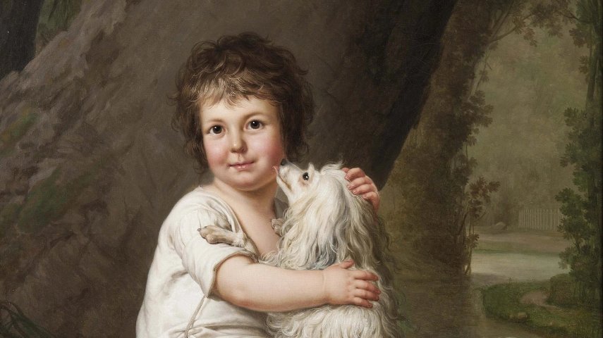 Two-year-old Henri Bertholet-Campan with his dog Aline