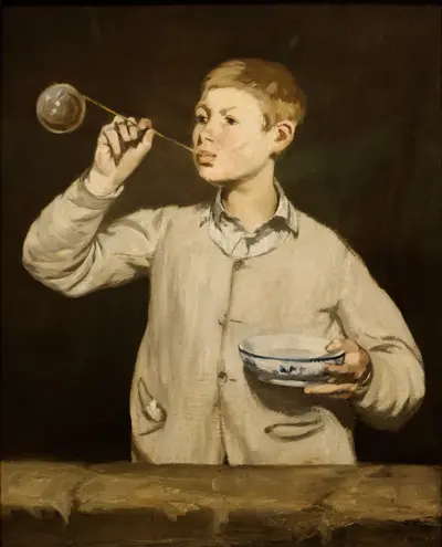 Boy blowing bubbles